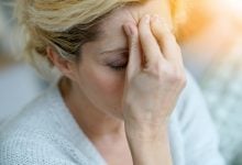Woman suffering from a headache