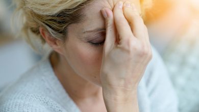 Woman suffering from a headache