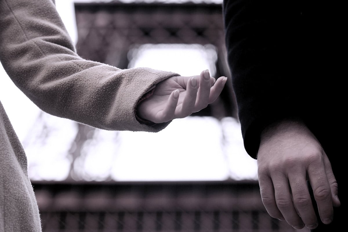 Reaching out to hold hand - can't find love