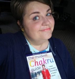 Amy holding Carol Tuttle's new chakra book