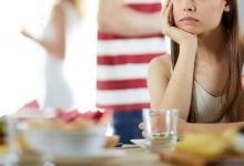 Woman sitting alone at a party
