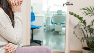 Woman nervous outside of treatment room