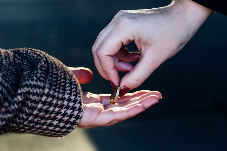 Two hands exchanging money